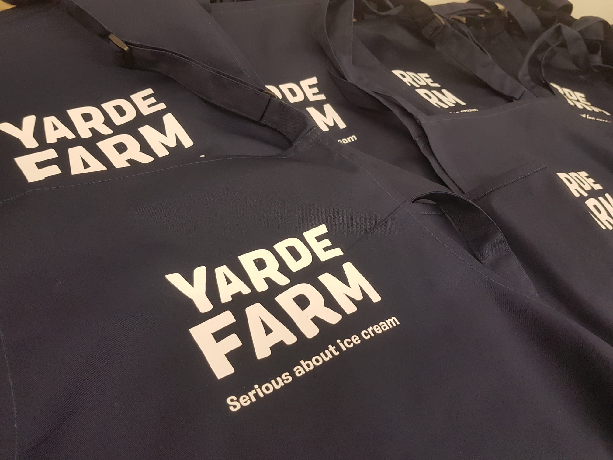Branded workwear jacket with an embroidered company logo